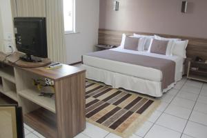 Postel nebo postele na pokoji v ubytování Hotel del Príncipe