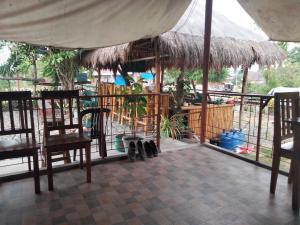 Balkón nebo terasa v ubytování The Garden Tropical Cabins + 9 fotografií