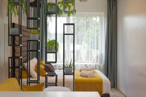 Postel nebo postele na pokoji v ubytování Munu Holiday Apartments