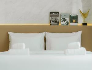 Voodi või voodid majutusasutuse ดิ เอเวอร์เรส พูลวิลล่า เขาใหญ่ The Everest Pool Villa Khaoyai toas