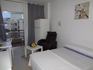 Postel nebo postele na pokoji v ubytování Hotel Carlos I