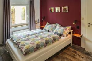 Postel nebo postele na pokoji v ubytování Ferienwohnung Malerstübchen