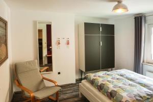 Postel nebo postele na pokoji v ubytování Ferienwohnung Malerstübchen