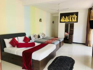 Postel nebo postele na pokoji v ubytování Sohili 3R Resort Ella