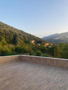 a balcony with a view of a mountain at High Garden Villas in Sapanca