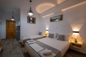 Postel nebo postele na pokoji v ubytování Apart Hotel Alex