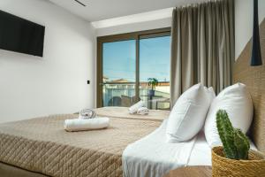 Giường trong phòng chung tại Hotel Papillon