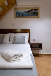 Postel nebo postele na pokoji v ubytování Apart Hotel Alex