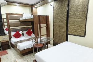 Postel nebo postele na pokoji v ubytování Hotel Spot Inn Paharganj Near New Delhi Railway Station