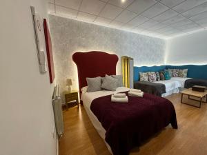 Posteľ alebo postele v izbe v ubytovaní ATENEO LOFT LUXURY Apartamento de 70 metros
