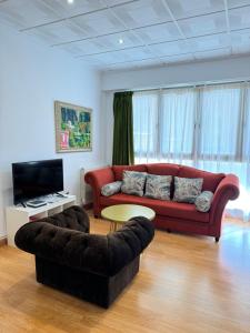 Televízia a/alebo spoločenská miestnosť v ubytovaní ATENEO LOFT LUXURY Apartamento de 70 metros