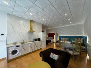 Kuchyňa alebo kuchynka v ubytovaní ATENEO LOFT LUXURY Apartamento de 70 metros