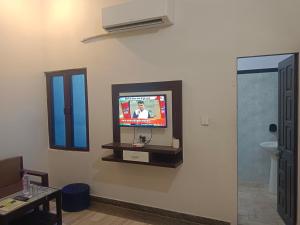 TV a/nebo společenská místnost v ubytování Hotel Mewad Haveli Pushkar