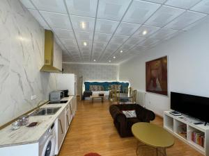 Kuchyňa alebo kuchynka v ubytovaní ATENEO LOFT LUXURY Apartamento de 70 metros