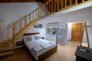Kuchyň nebo kuchyňský kout v ubytování Apart Hotel Alex