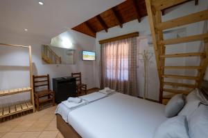 Postel nebo postele na pokoji v ubytování Apart Hotel Alex