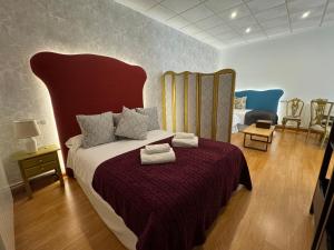 Posteľ alebo postele v izbe v ubytovaní ATENEO LOFT LUXURY Apartamento de 70 metros