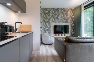Η κουζίνα ή μικρή κουζίνα στο Hello Zeeland - Appartement Duno Lodge G