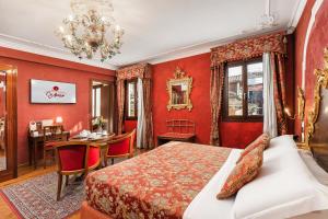 Postel nebo postele na pokoji v ubytování Hotel Ca' Alvise
