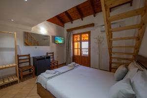 Postel nebo postele na pokoji v ubytování Apart Hotel Alex