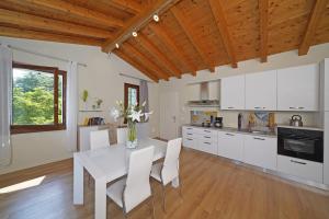 Η κουζίνα ή μικρή κουζίνα στο Residence Albatros by Wonderful Italy
