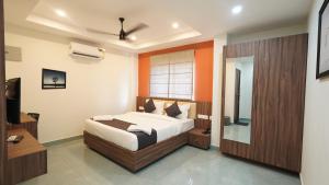 Hotel Hive Inn - Kozhikode客房内的一张或多张床位