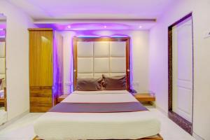 Postel nebo postele na pokoji v ubytování Hotel O Address Inn