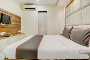 Postel nebo postele na pokoji v ubytování Hotel O Address Inn