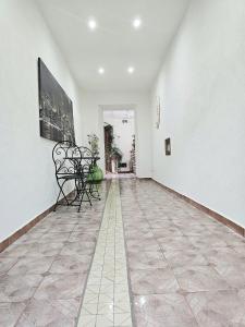 TV a/nebo společenská místnost v ubytování PRESTIGE casa vacanze