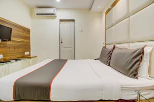 Postel nebo postele na pokoji v ubytování Hotel O Address Inn