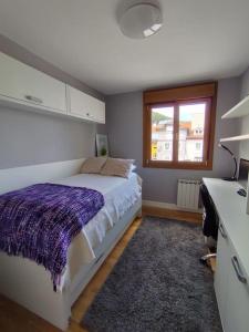 Un pat sau paturi într-o cameră la La casita de Lu