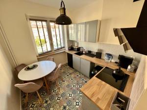 Η κουζίνα ή μικρή κουζίνα στο Octopus Apartament