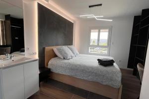 Postel nebo postele na pokoji v ubytování Naturiste Cap d'Agde Port Nature 548