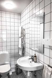 Baðherbergi á Gårdens & Apotekarns B&B