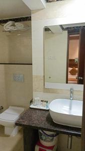 Koupelna v ubytování Hotel Pushpak