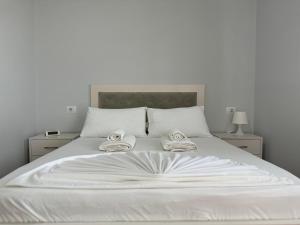 Postel nebo postele na pokoji v ubytování Villa Almando