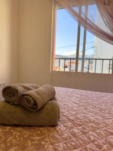 Postel nebo postele na pokoji v ubytování Casa en Torrox, España