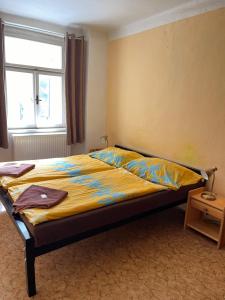 Postel nebo postele na pokoji v ubytování Travel Apartmá