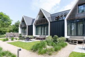 Κήπος έξω από το Hello Zeeland - Appartement Duno Lodge L