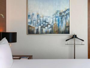 Postel nebo postele na pokoji v ubytování Fairmont Bab Al Bahr