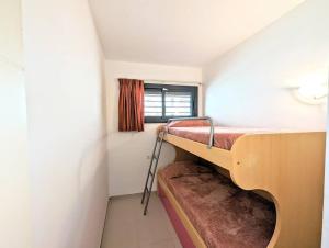 Apartamento En el Port dAro by Host&Joy客房内的一张或多张床位