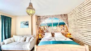 Postel nebo postele na pokoji v ubytování Baltic Del Mar z Widokiem na Morze by Baltic Batavia