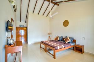Фотография из галереи Papilio Beach Front Cottages-TBV в Баге