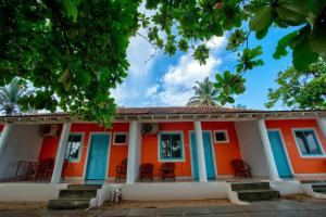 Фотография из галереи Papilio Beach Front Cottages-TBV в Баге