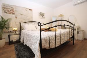 Posteľ alebo postele v izbe v ubytovaní Apartment ARCHIE
