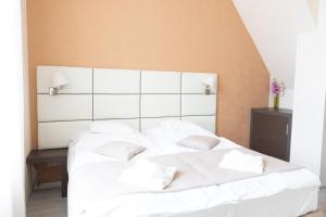 Posteľ alebo postele v izbe v ubytovaní Badacsony Villa Ria