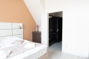 Posteľ alebo postele v izbe v ubytovaní Badacsony Villa Ria