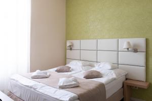 Posteľ alebo postele v izbe v ubytovaní Badacsony Villa Ria