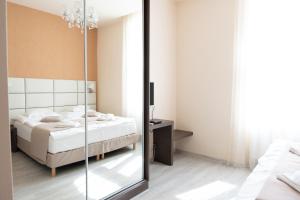 Posteľ alebo postele v izbe v ubytovaní Badacsony Villa Ria