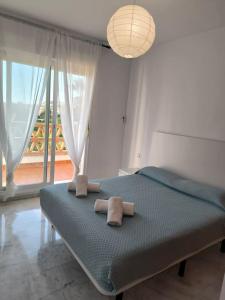 Voodi või voodid majutusasutuse White at Island Resort toas